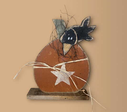 Pumpkin with crow