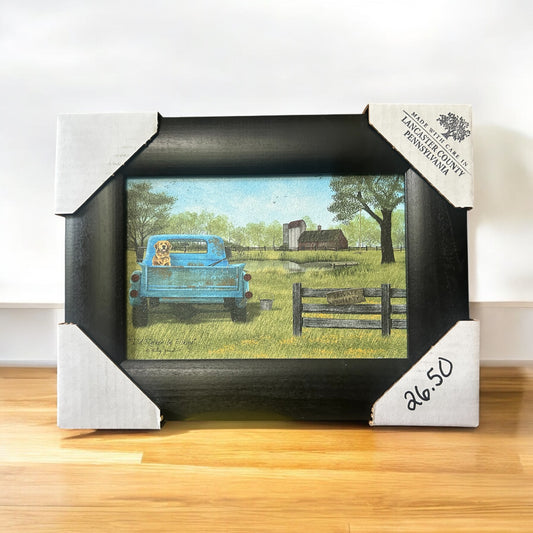 Dog In Blue Pickup Truck